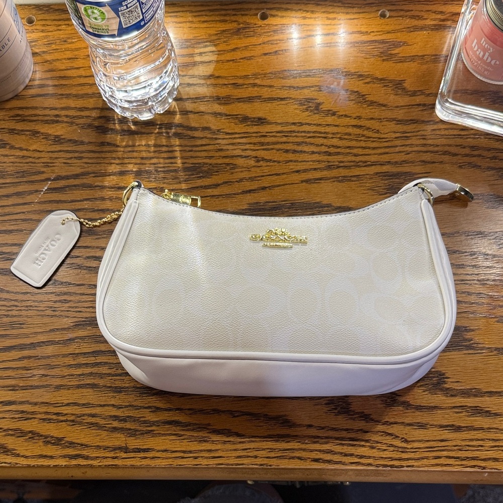 Coach Ivory Leather Wristlet
